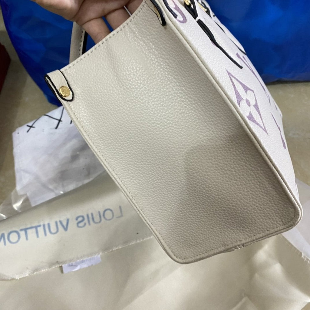 ONTHEGO PM 25 CREME GEPRÄGTES GENARBIGES RINDLEDER 