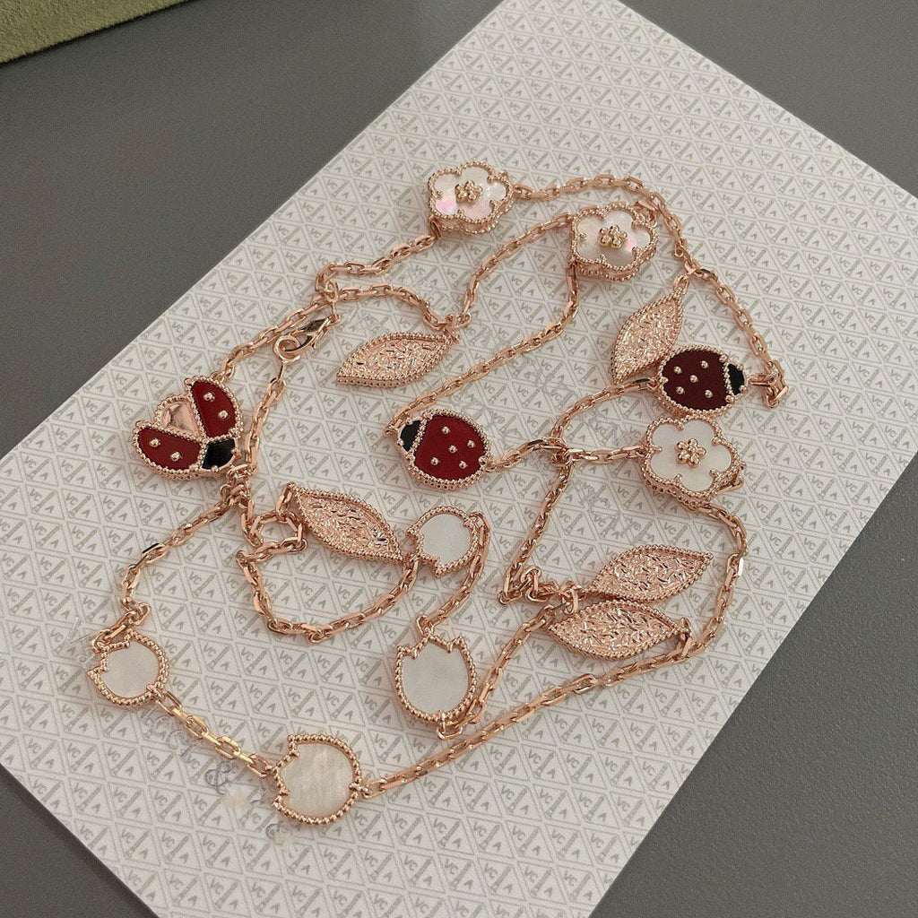 Imperial Lucky Spring Halskette mit 15 Motiven aus Roségold