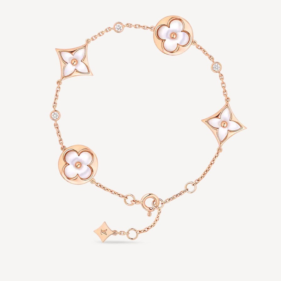 ¡®Imperial¡¯STAR AND SUN 4 MOTIF WHITE MOP PINK GOLD BRACELET