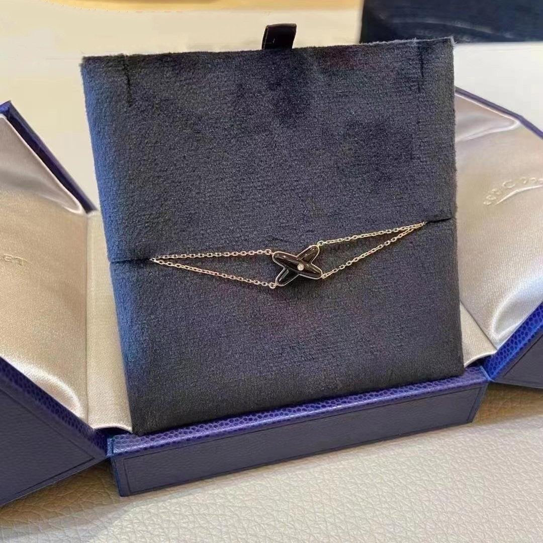 Imperial JEUX ARMBAND ONYX ROSA GOLD 1 DIAMANT