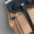 HERBAG A DOS ZIP RETOURNE RUCKSACK 29 IN BRAUNEM CANVAS UND SCHWARZEM KALBSLEDER