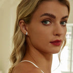 Ohrstecker mit Muschelmuster, besetzt mit grünen Zirkonia, hypoallergen