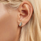 Ohrstecker mit Muschelmuster, besetzt mit grünen Zirkonia, hypoallergen